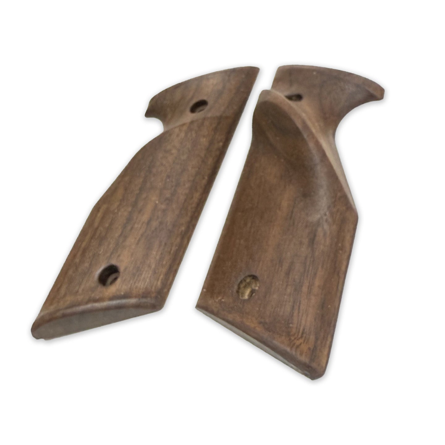 Walnut grips with raised thumb shelf for right handed shooters